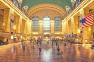 Q. How can I travel from LGA to JFK by train?
