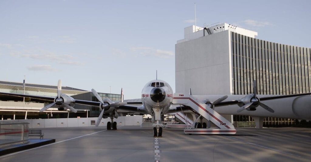 Historic aircraft parked at TWA Hotel showcasing classic aviation design in New York City.