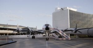 Historic aircraft parked at TWA Hotel showcasing classic aviation design in New York City.