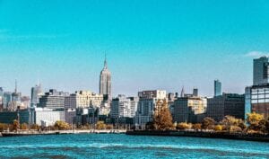A stunning daytime view of New York City's skyline featuring the iconic Empire State Building.