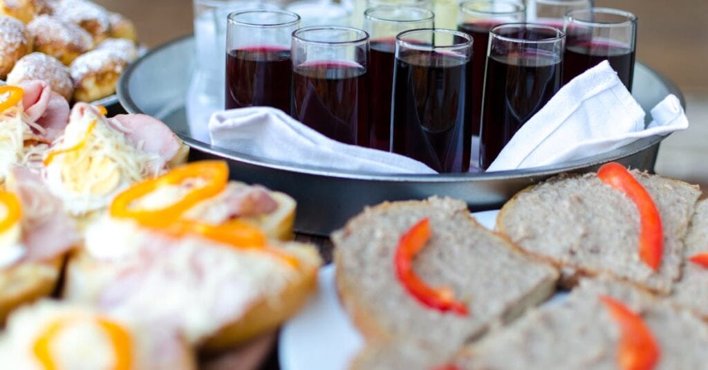 A beautifully arranged buffet with assorted foods and drinks, perfect for events or gatherings.
