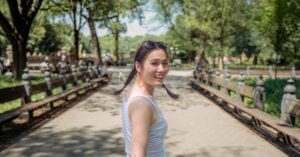 A joyful moment captured in a summer day at a New York City park.