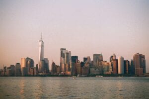A stunning view of the New York City skyline featuring iconic skyscrapers during sunset. Perfect for urban themes.