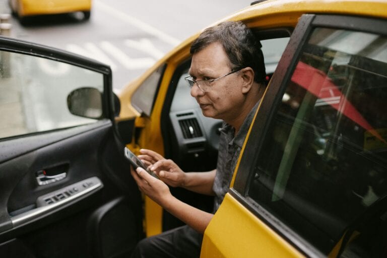 how much is a yellow cab from jfk to manhattan