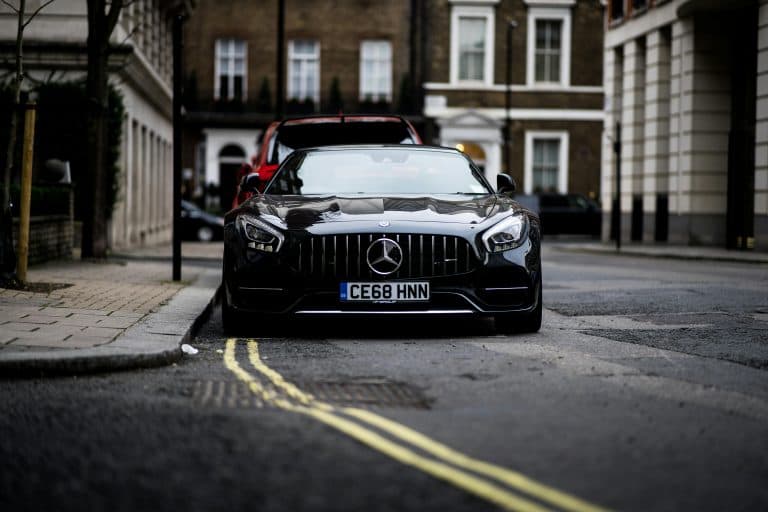 Car Service Blogs | Articles | News | Tips & Tricks | Video | FAQ | Information | Infograph. 38 A sleek black Mercedes Benz parked on a London street, showcasing luxury and style.
