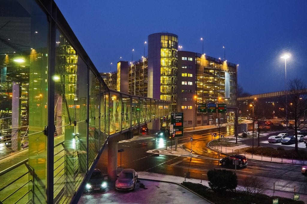 architecture, building, modern, night, city, facade, tourism, airport, to travel, road, rails, rail, cars, multi storey car park, vehicle, traffic, lights, illuminated, infrastructure, crossing, traffic lights, dusseldorf, bridge, pedestrian bridge, airport, airport, airport, airport, airport