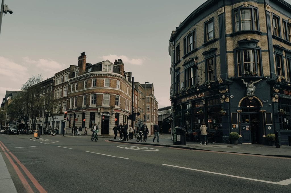Charming London street scene featuring classic architecture and a bustling city vibe.