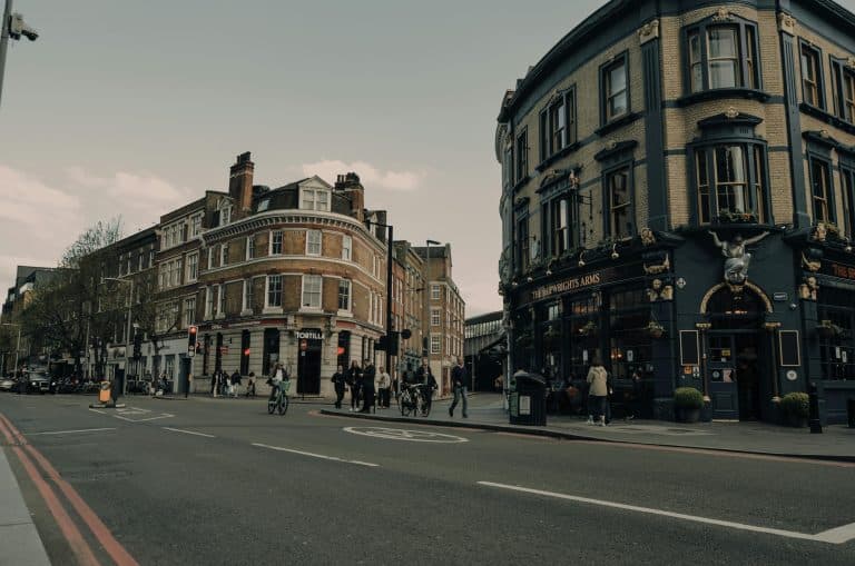 Charming London street scene featuring classic architecture and a bustling city vibe.