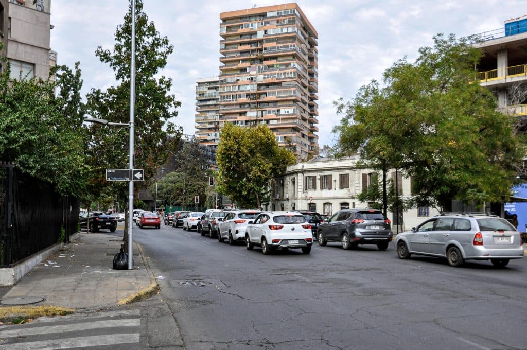 limo from laguardia to manhattan reviews 2026: Honest Real Costs, Fixed Rates & What Travelers Actually Experienc 7 Busy urban street scene in Santiago, Chile featuring traffic and high-rise buildings.