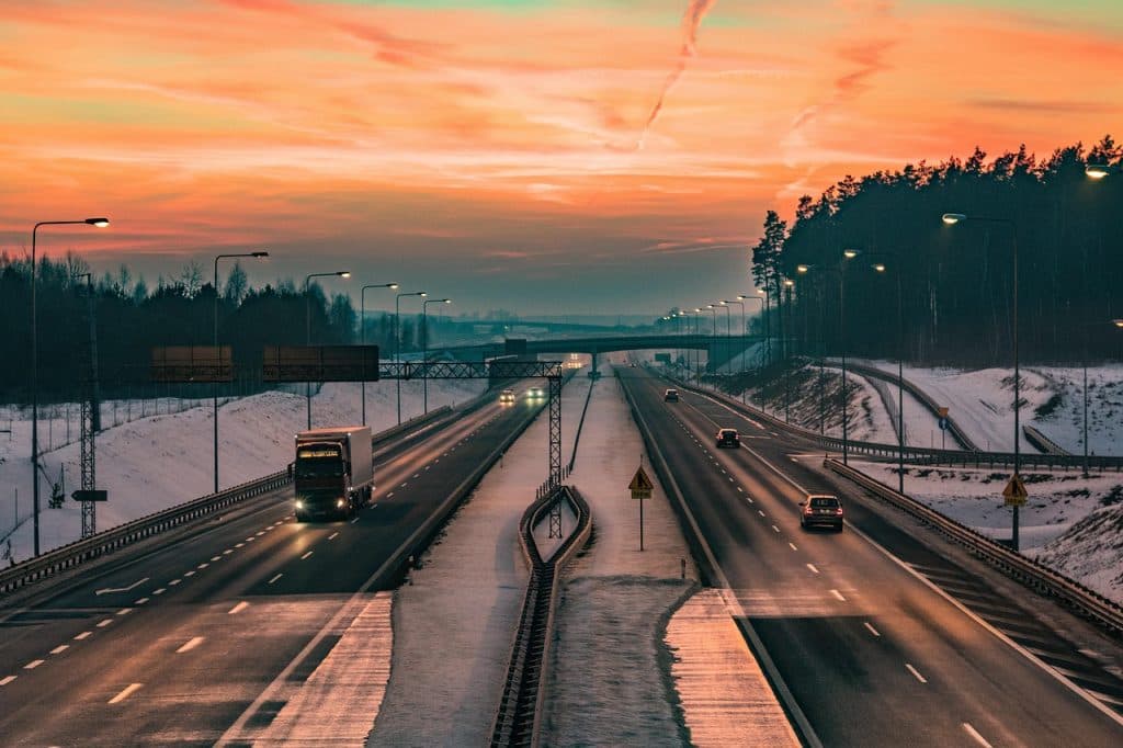 Reliable Car Service NYC to Newark: 7 Honest Facts for 2026 17 way, sky, clouds, street, forest, twilight, highway, nature, asphalt