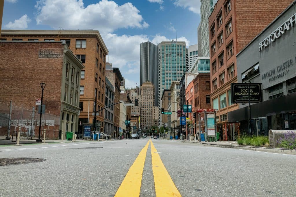 Empty street view in downtown San Francisco highlighting urban architecture and cityscape.