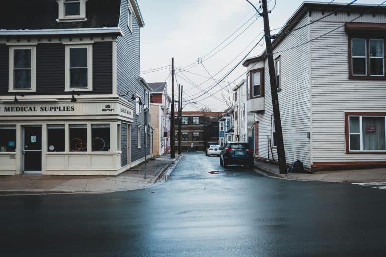 Car Service Blogs | Articles | News | Tips & Tricks | Video | FAQ | Information | Infograph. 31 Facade of residential houses and wet asphalt road located on street of city