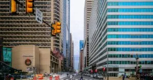 Vibrant cityscape of Philadelphia showcasing iconic skyscrapers and bustling streets.
