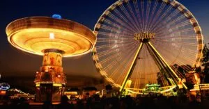 Capture the magic of a night carnival. Bright lights and thrilling rides create a captivating scene.