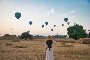 woman, field, hot air balloons, balloons, trees, leaves, foliage, nature, travel, tourism, sunrise, landscape, travel, travel, travel, travel, travel
