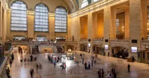 Vibrant interior of Grand Central Terminal, showcasing its iconic architecture and bustling atmosphere.