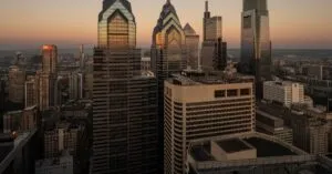 Breathtaking view of Philadelphia's modern skyline at sunset featuring iconic skyscrapers.