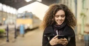 Crowded scene at JFK taxi stand for how much is a taxi from JFK to Manhattan