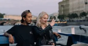 Black car service on one of the best routes from JFK to Manhattan, parked at Terminal 4 with skyline backdrop.