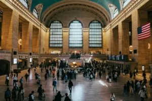 Lively atmosphere inside Grand Central Terminal, bustling with travelers and iconic architecture.