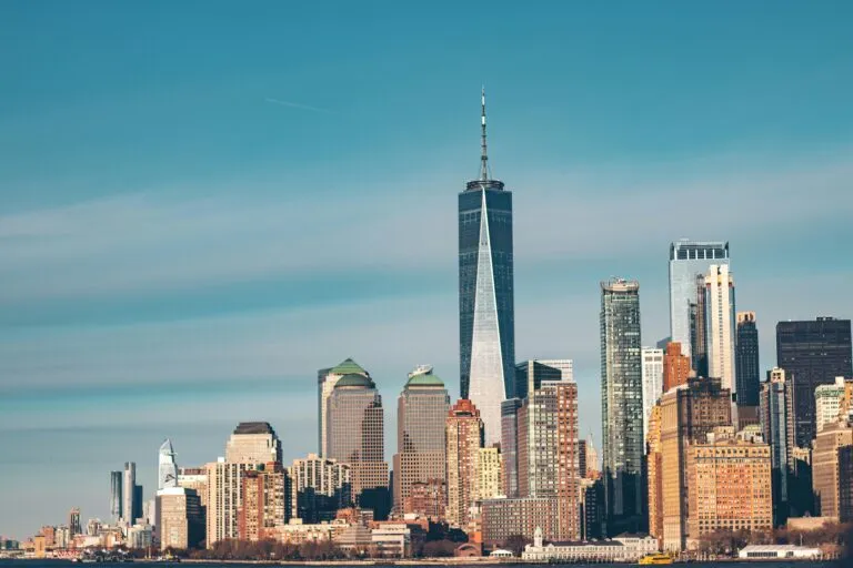 Stunning view of New York City skyline with One World Trade Center and modern architecture.