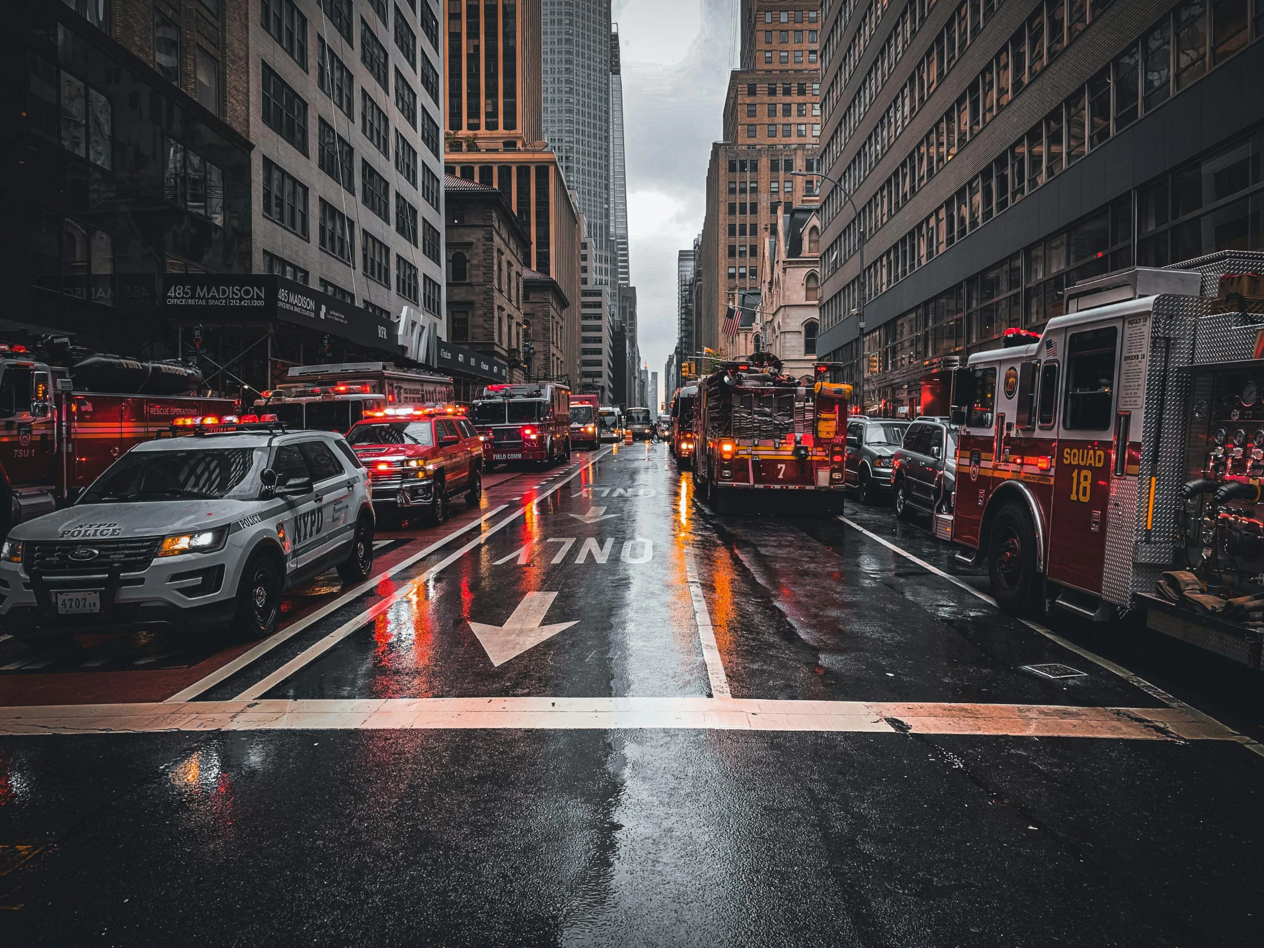 Blogs | Articles | News | Tips & Tricks | Video | FAQ | Infomation 18 Firetrucks and police cars respond to an emergency on a wet street in New York City.